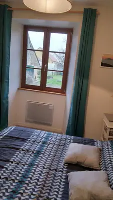 Un ou plusieurs lits dans un hébergement de l'établissement appartement dans propriétée privée