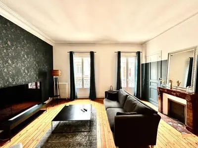 Coin salon dans l'établissement Appartements Plantagenet - Le 33