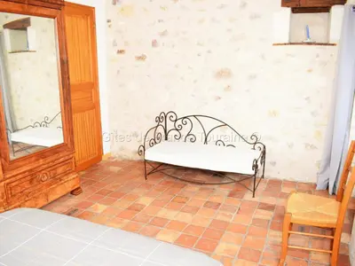 Un ou plusieurs lits dans un hébergement de l'établissement Gîte de charme du XVIIIe avec jardin, proche des châteaux et vignobles de Touraine, équipements inclus - FR-1-381-365