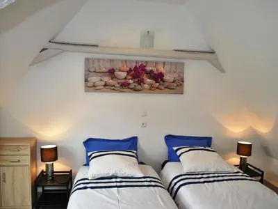 Un ou plusieurs lits dans un hébergement de l'établissement Gîte de charme en Touraine avec clim, jardin et toutes commodités incluses, proche Châteaux de la Loire - FR-1-381-102