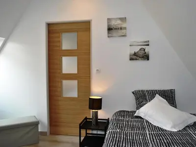 Un ou plusieurs lits dans un hébergement de l'établissement Gîte de charme en Touraine avec clim, jardin et toutes commodités incluses, proche Châteaux de la Loire - FR-1-381-102