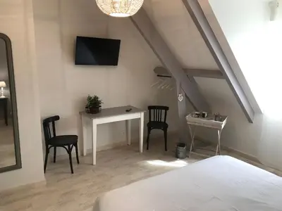 Un ou plusieurs lits dans un hébergement de l'établissement Au coeur des châteaux