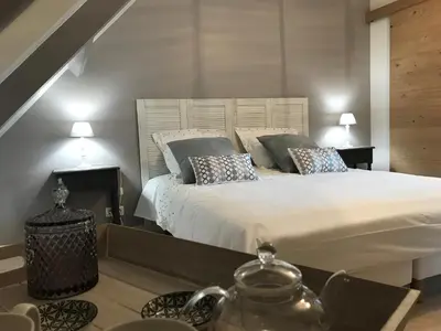 Un ou plusieurs lits dans un hébergement de l'établissement Au coeur des châteaux