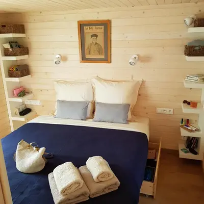 Un ou plusieurs lits dans un hébergement de l'établissement Le Domaine Des Anges, écolodge