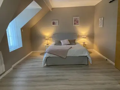 Un ou plusieurs lits dans un hébergement de l'établissement La vieille maison