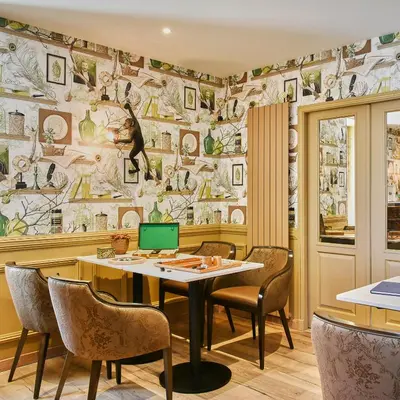 Coin salon dans l'établissement Logis Hôtels Restaurant La Mère Hamard