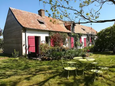Jardin de l'établissement Chambre chez l'habitant