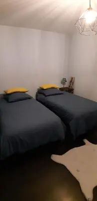 Un ou plusieurs lits dans un hébergement de l'établissement chambre chez l'habitant
