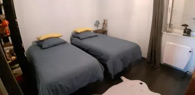 Un ou plusieurs lits dans un hébergement de l'établissement chambre chez l'habitant