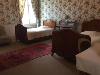 Un ou plusieurs lits dans un hébergement de l'établissement Château de Pintray