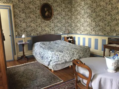 Un ou plusieurs lits dans un hébergement de l'établissement Château de Pintray