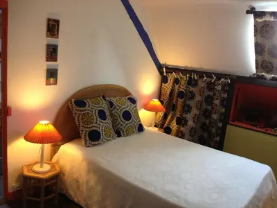 Un ou plusieurs lits dans un hébergement de l'établissement La Maison Céladon