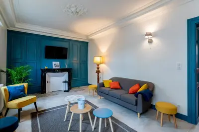 Télévision ou salle de divertissement dans l'établissement Le Garage, Le Gite