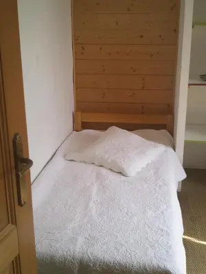 Un ou plusieurs lits dans un hébergement de l'établissement Chambre chez l'habitant au centre ville