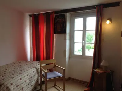Un ou plusieurs lits dans un hébergement de l'établissement Chambre chez l'habitant au centre ville