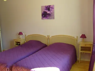 Un ou plusieurs lits dans un hébergement de l'établissement Hostellerie le Clos du Cher
