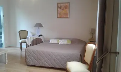Un ou plusieurs lits dans un hébergement de l'établissement Hostellerie le Clos du Cher