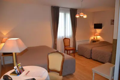 Coin salon dans l'établissement Hostellerie le Clos du Cher