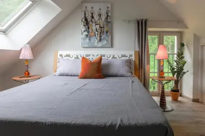 Un ou plusieurs lits dans un hébergement de l'établissement Country House - La Charbonnière