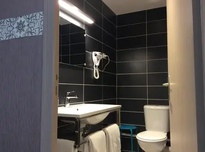 Salle de bains dans l'établissement Hotel Berthelot