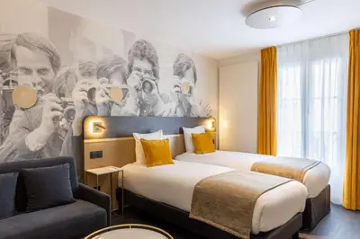 Un ou plusieurs lits dans un hébergement de l'établissement Best Western Plus l'Artist Hotel