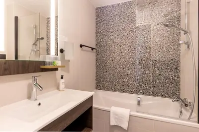 Salle de bains dans l'établissement Best Western Plus l'Artist Hotel