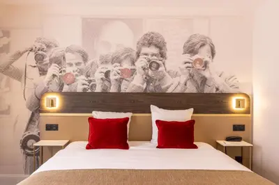 Un ou plusieurs lits dans un hébergement de l'établissement Best Western Plus l'Artist Hotel