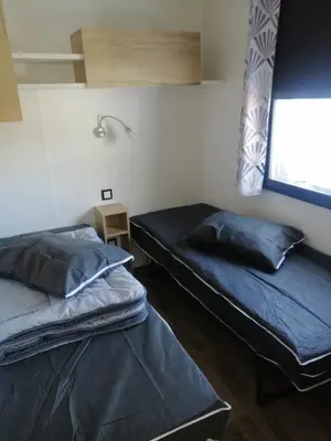 Un ou plusieurs lits dans un hébergement de l'établissement MHVACANCES LOUENT PLUSIEURS MOBILHOMES DANS CAMPING 4 ETOILES PROCHE CHATEAUX et ZOO BEAUVAL