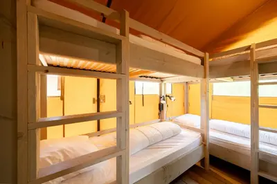 Un ou plusieurs lits dans un hébergement de l'établissement Glamping Loire Valley