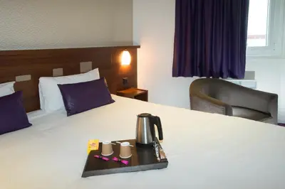 Un ou plusieurs lits dans un hébergement de l'établissement Brit Hotel Tours Sud – Le Cheops