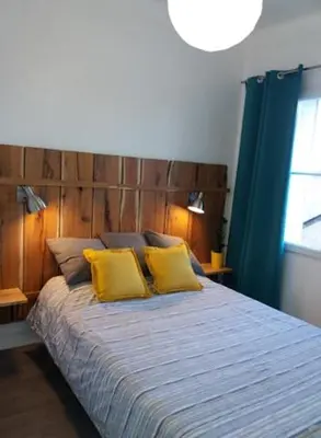 Un ou plusieurs lits dans un hébergement de l'établissement Appt 2ème étage sur l’ile de Saumur