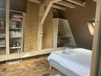 Un ou plusieurs lits dans un hébergement de l'établissement Chambre Alix