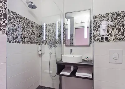 Salle de bains dans l'établissement Tourhotel Blois
