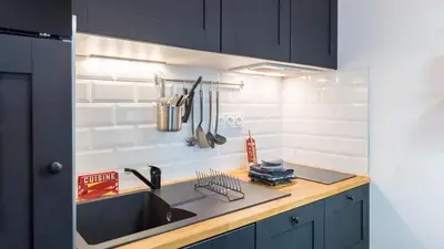 Cuisine ou kitchenette dans l'établissement L'Atelier fil à fil