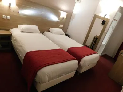 Un ou plusieurs lits dans un hébergement de l'établissement The Originals City, Hôtel Ambacia, Tours Sud