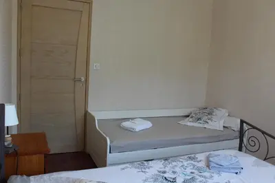 Un ou plusieurs lits dans un hébergement de l'établissement B&B La Lyre