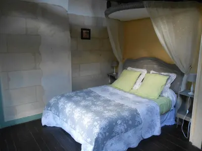 Un ou plusieurs lits dans un hébergement de l'établissement Clos du Bois Brard B&B