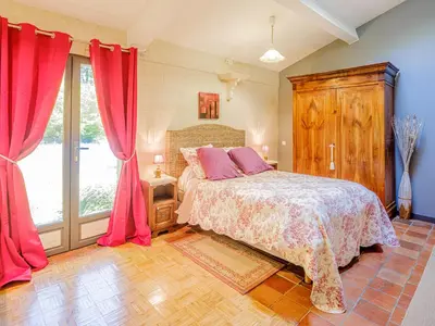 Un ou plusieurs lits dans un hébergement de l'établissement Clos du Bois Brard B&B