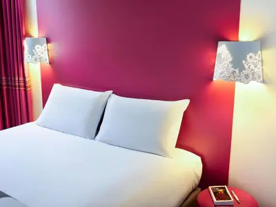 Un ou plusieurs lits dans un hébergement de l'établissement Mercure Le Mans Batignolles - Hotel & Spa