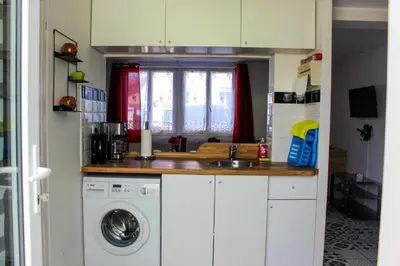 Cuisine ou kitchenette dans l'établissement Appartement avec Terrasse