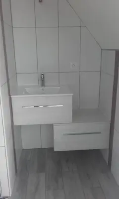 Salle de bains dans l'établissement Chambre d'hôte du HOUSSAY à VALENNES 72320