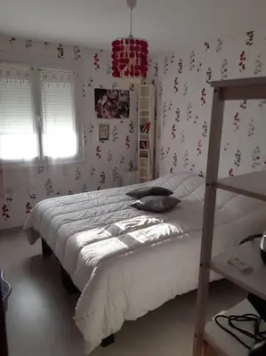Un ou plusieurs lits dans un hébergement de l'établissement Grande chambre proche circuit des 24h du Mans