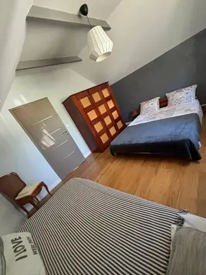 Un ou plusieurs lits dans un hébergement de l'établissement 13 Rue du Perré Maison de vacances