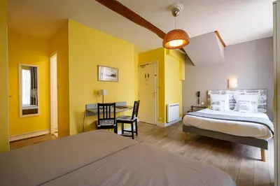 Un ou plusieurs lits dans un hébergement de l'établissement Hotel Val De Loire