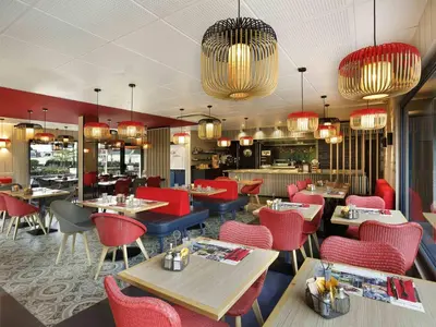 Restaurant ou autre lieu de restauration dans l'établissement ibis Le Mans Est Pontlieue