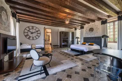 Un ou plusieurs lits dans un hébergement de l'établissement Château de la Ronde