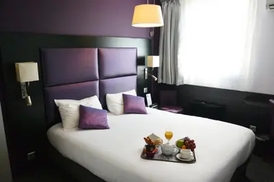 Un ou plusieurs lits dans un hébergement de l'établissement Au Relais Saint-Éloi, Tours