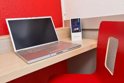 Télévision ou salle de divertissement dans l'établissement Premiere Classe Tours Sud - Joue Les Tours