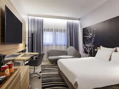 Un ou plusieurs lits dans un hébergement de l'établissement Novotel Tours Centre Gare