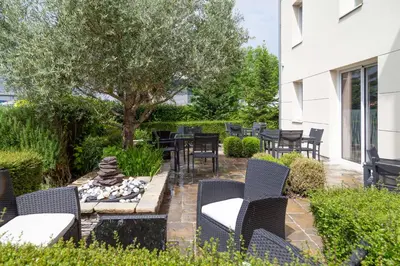 Jardin de l'établissement Brit Hotel Saumur